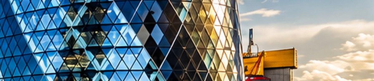 Glass-fronted commercial building under construction